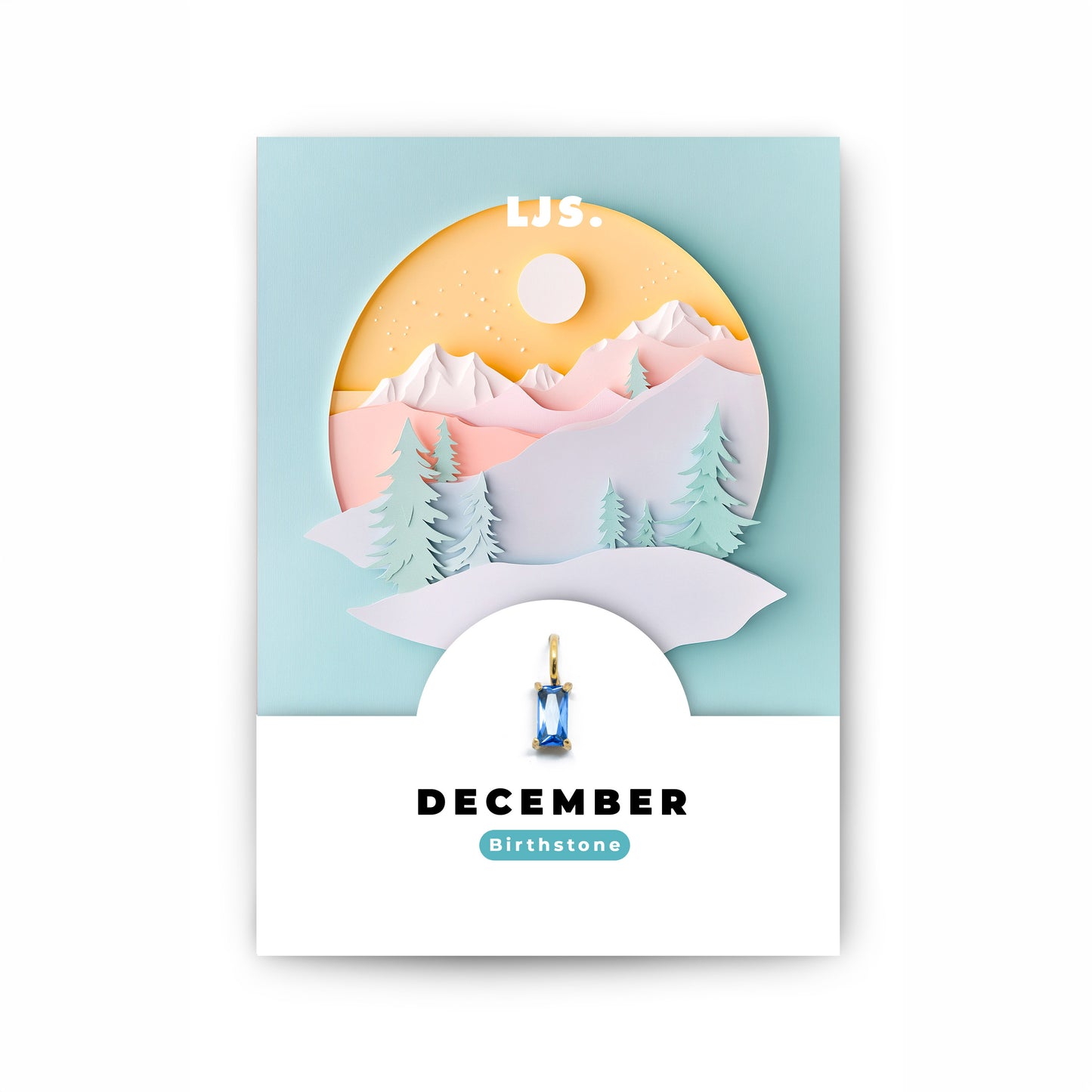 Schmuckanhänger mit blauem Zirkonia-Kristall als Geburtsstein für das Monat Dezember, auf einer Geschenkkarte von Little Jewellery Stories