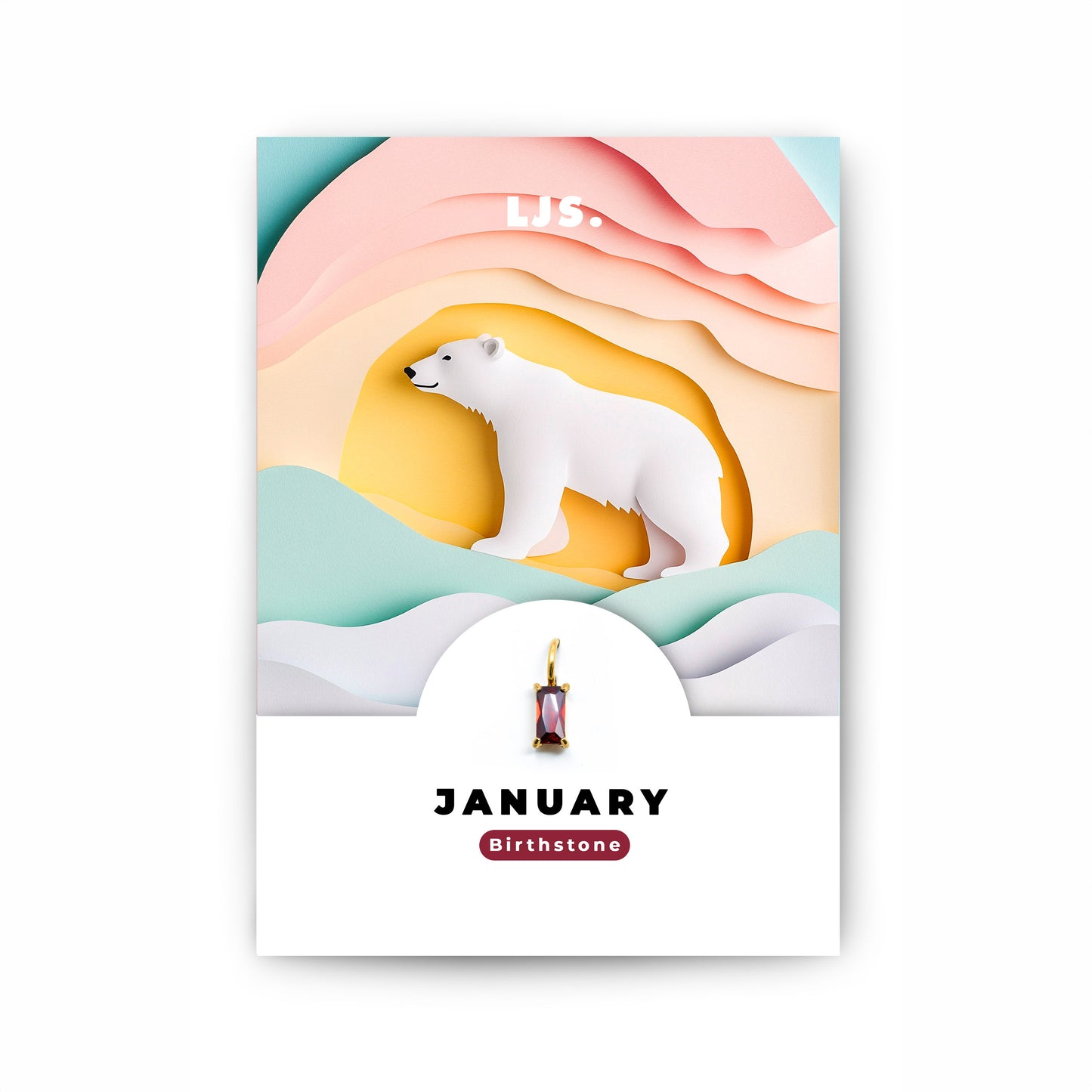 Schmuckanhänger mit dunkelrotem Zirkonia-Kristall als Geburtsstein für das Monat Januar, auf einer Geschenkkarte von Little Jewellery Stories