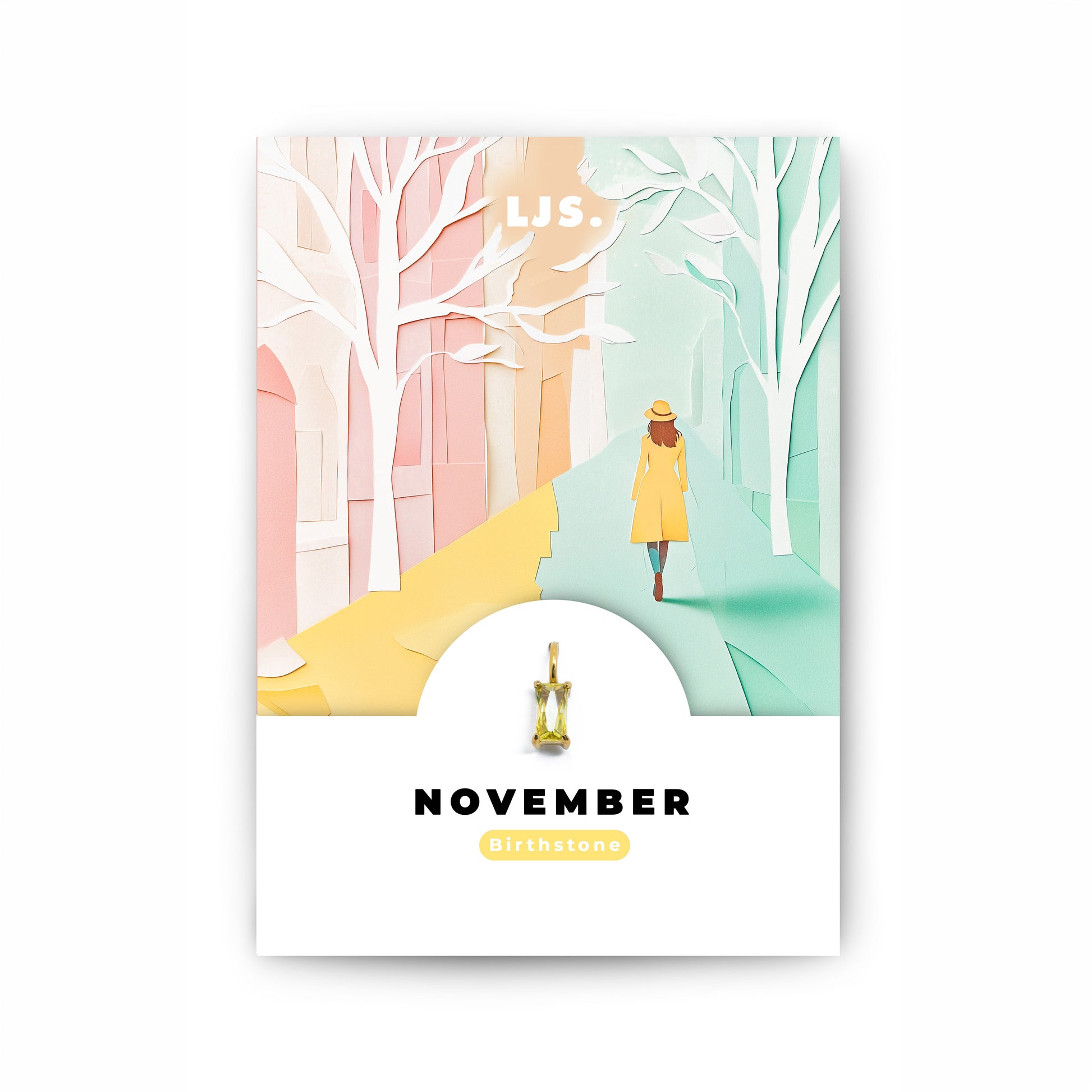 Schmuckanhänger mit gelbem Zirkonia-Kristall als Geburtsstein für das Monat November, auf einer Geschenkkarte von Little Jewellery Stories