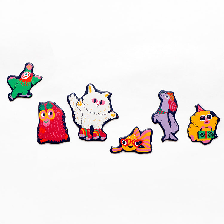 Detailansicht einzelner, tierförmiger Puzzleteile des Haustierparty-Puzzles mit bunten Farben und liebevollen Illustrationen.