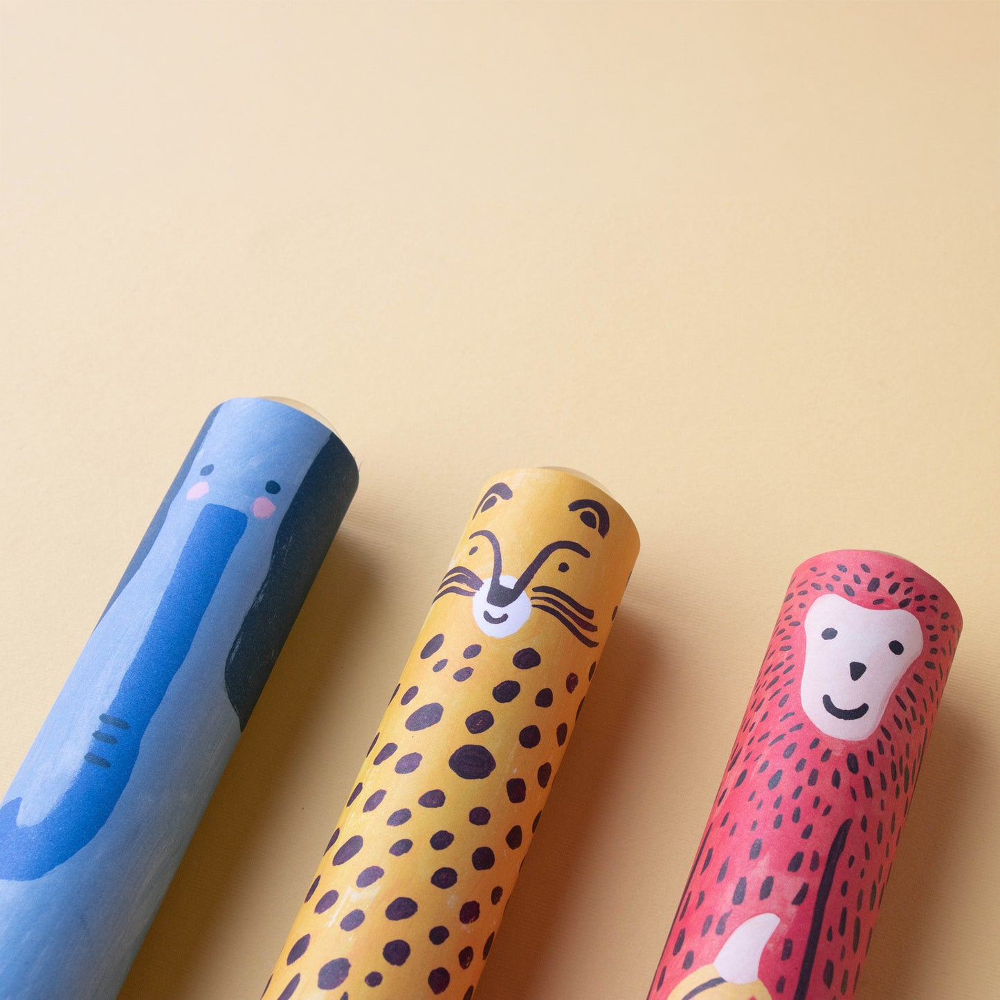 Kaleidoskop von Londji mit Elefant-, Gepard- und Affen-Illustration