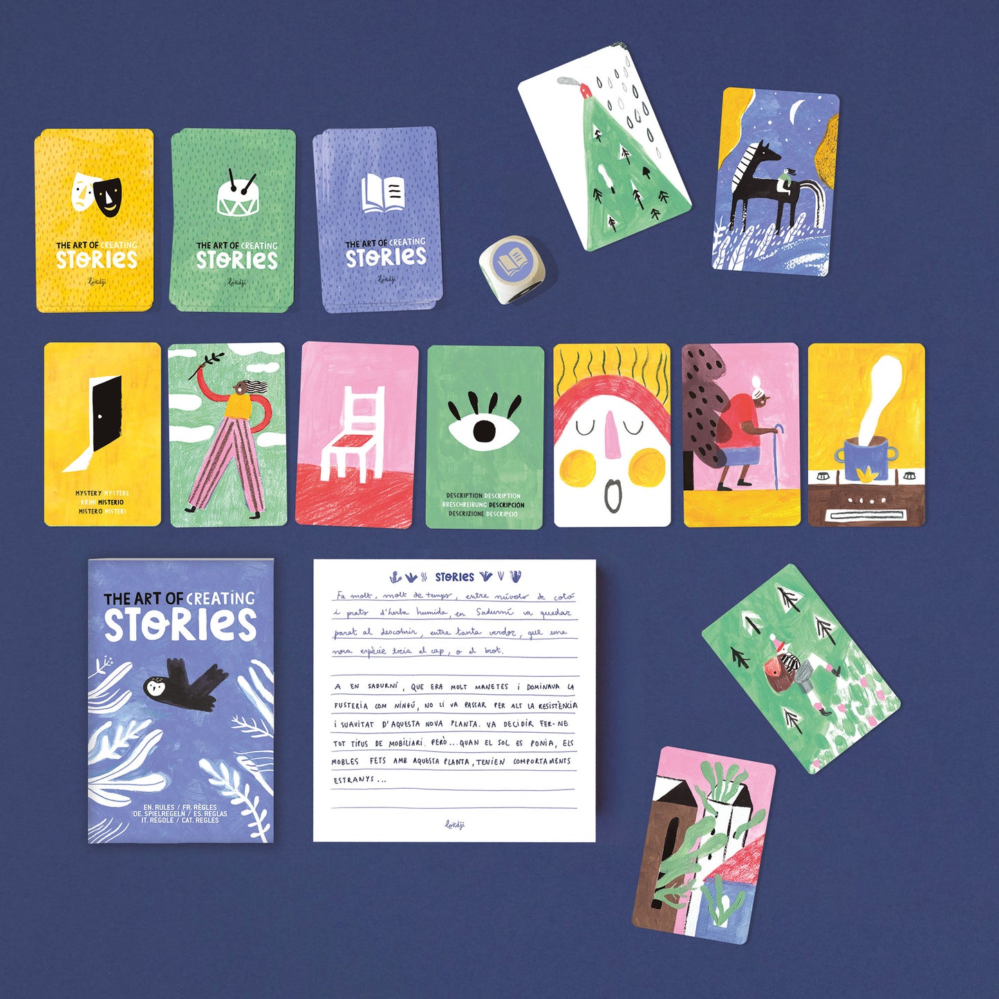 Spiel „Stories“ von Londji mit Spielanleitung, Block und ausgelegten Spielkarten, aus denen eine Geschichte entwickelt werden soll