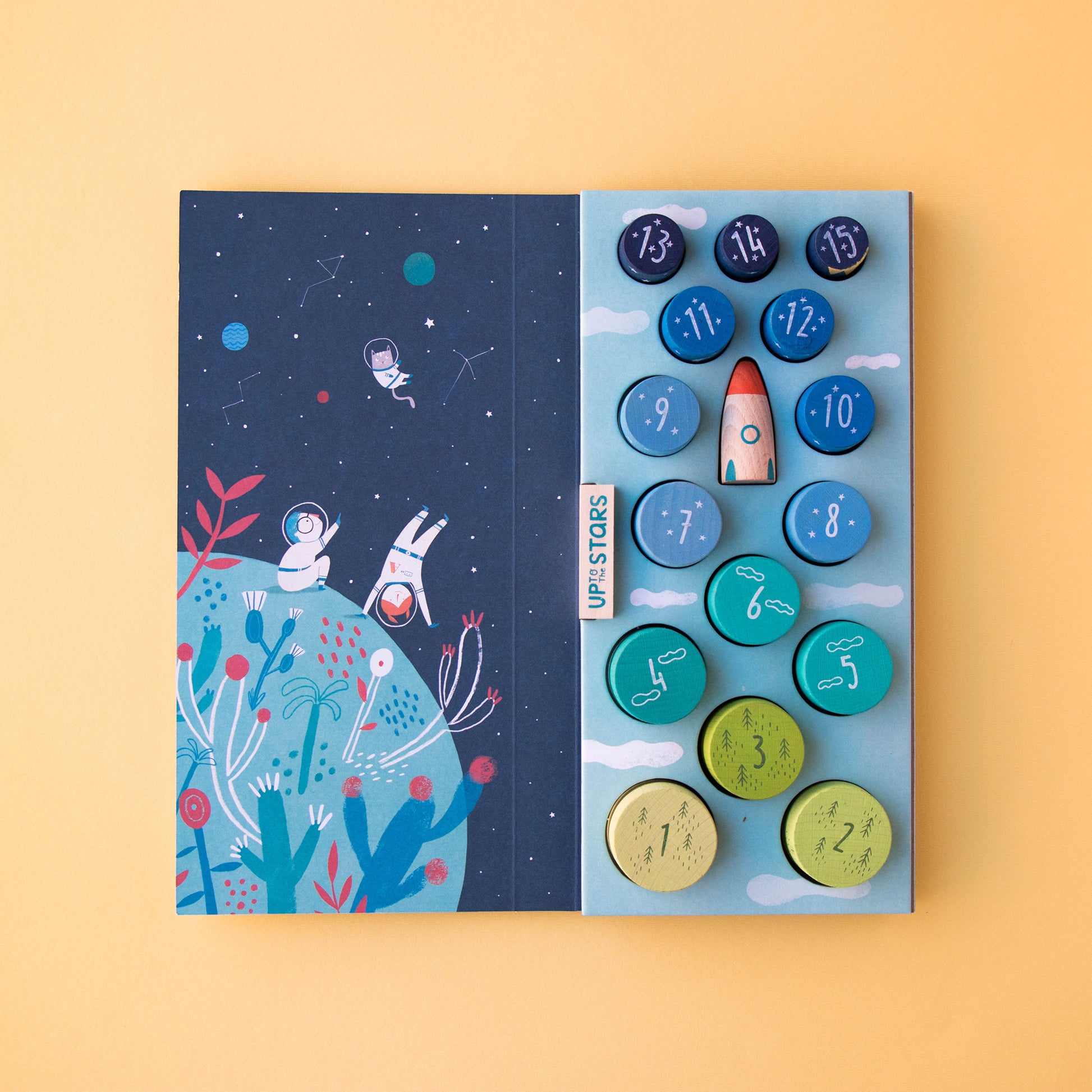 Die Verpackung des Up to the stars Holz-Stapelspiels von Londji als Sortierbox für die einzelnen Teile