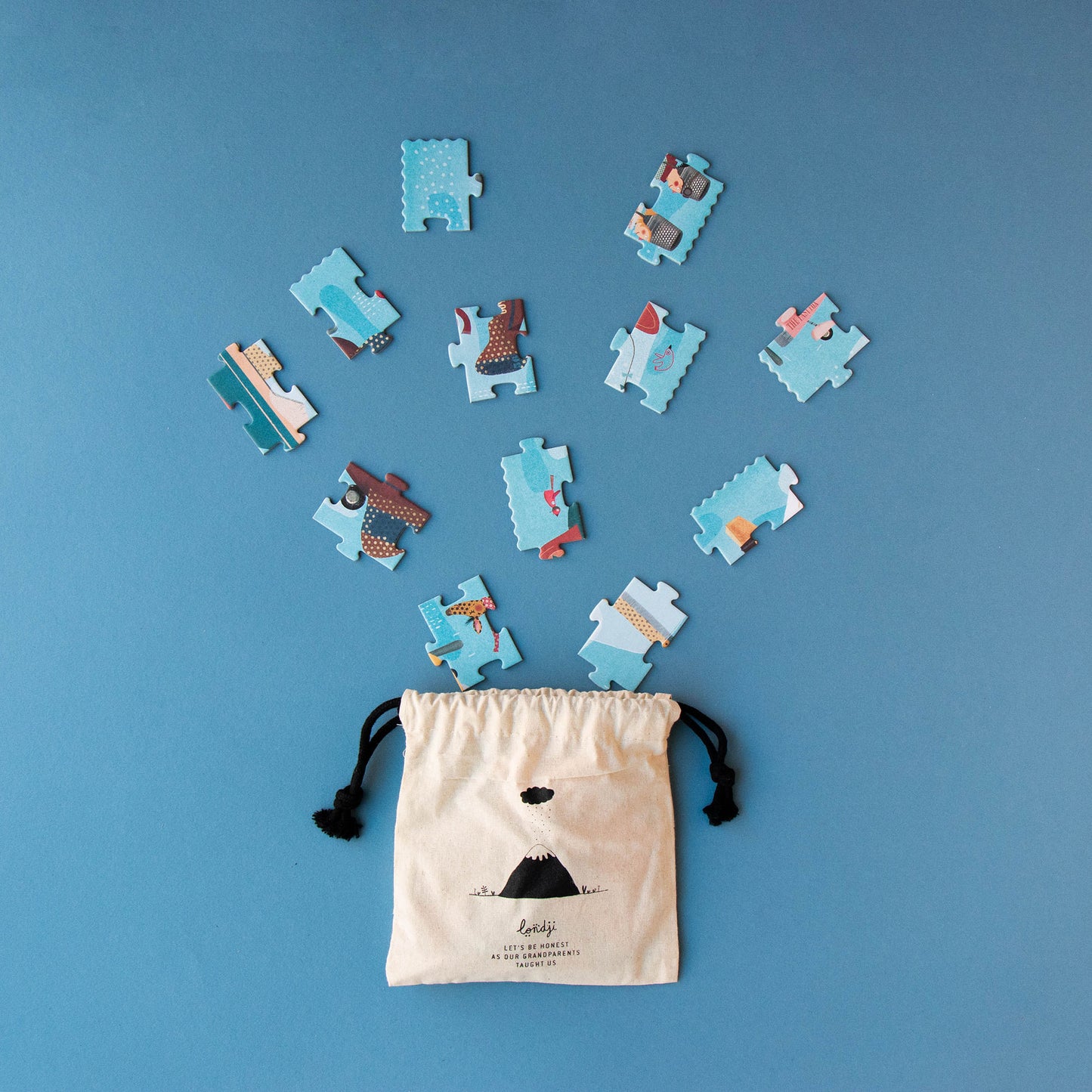 Bedruckter Stoffbeutel für die Puzzleteile des Volare Flugzeug-Puzzles von Londji