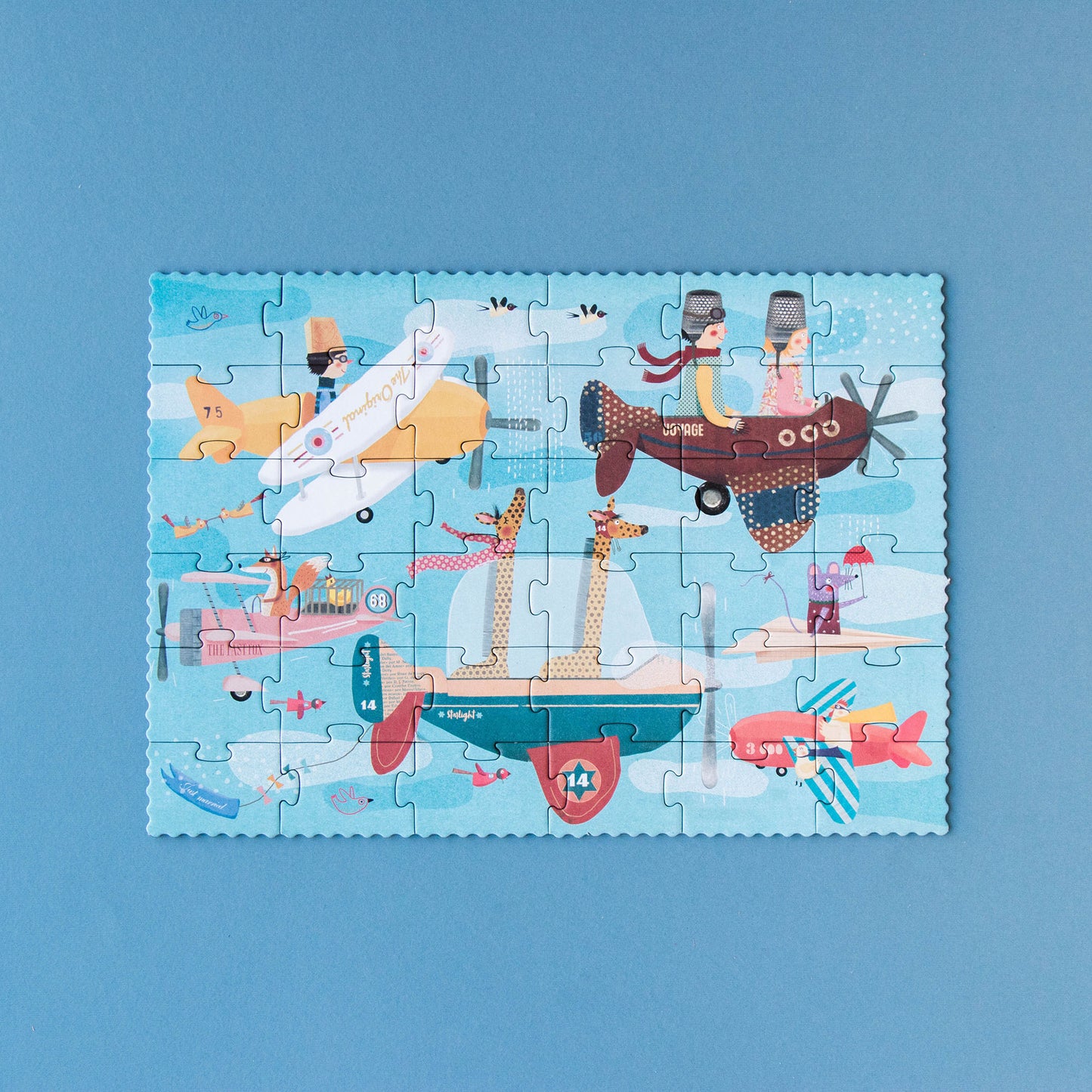 Gesamtansicht des Volare Flugzeug-Puzzles mit Flugzeugen und Tieren von Londji